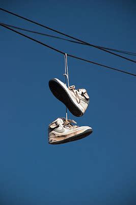 shoes on telephone line meaning.